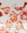 Schal mit Muster und Pompoms